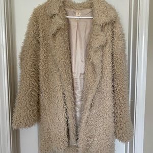 Cream teddy coat from a boutique
